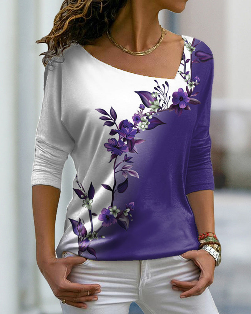 FloraFlex™ - T-shirt med asymmetrisk hals och blommigt tryck