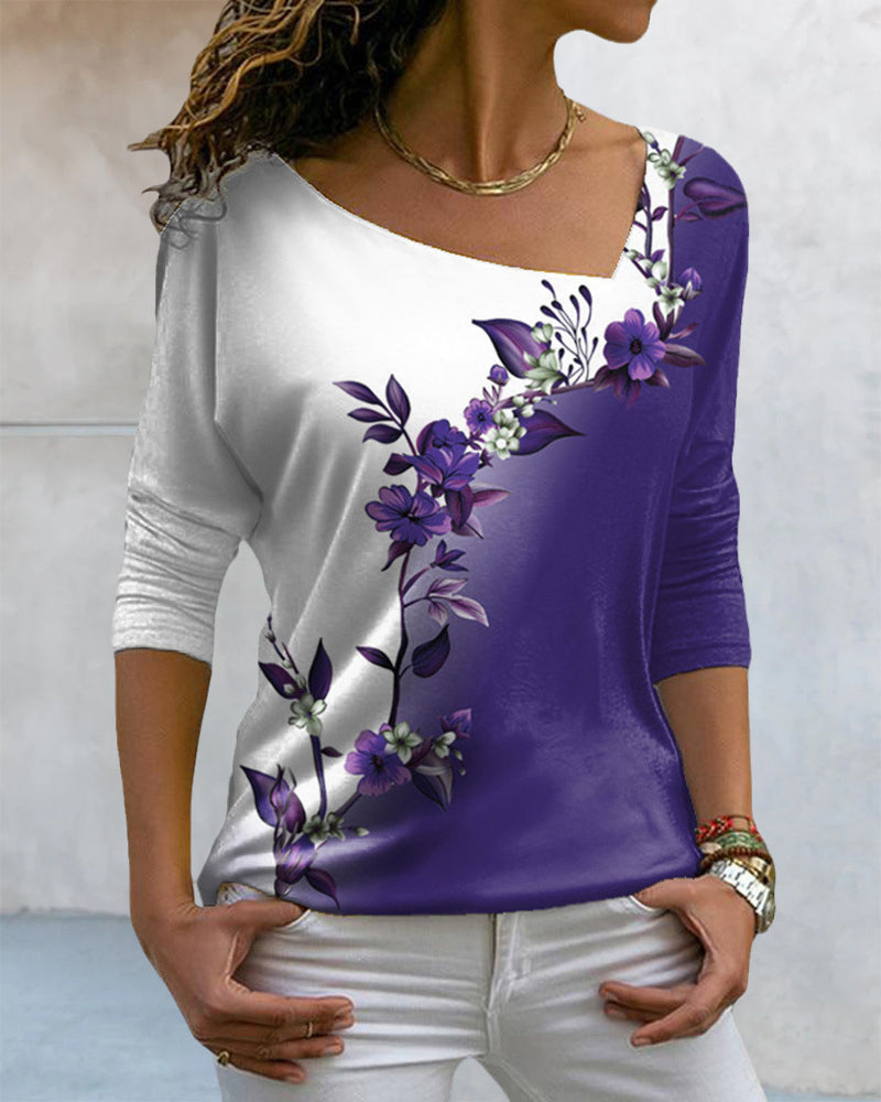 FloraFlex™ - T-shirt med asymmetrisk hals och blommigt tryck