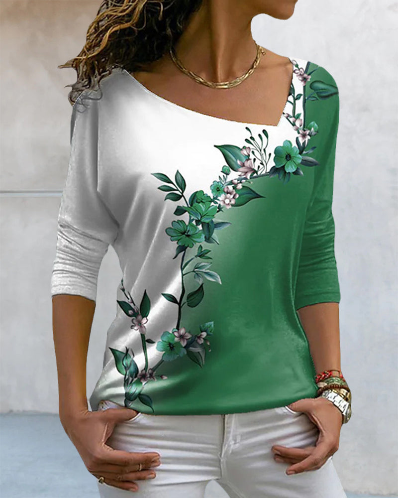 FloraFlex™ - T-shirt med asymmetrisk hals och blommigt tryck